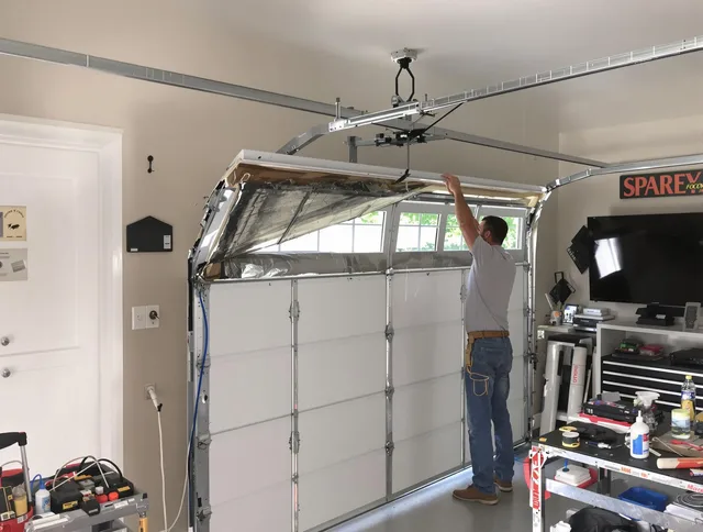 Garage door section replacement by Berlin Garage Door Repair in Berlin