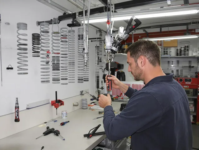 Berlin Garage Door Repair safety certified technician performing precision spring replacement in Berlin